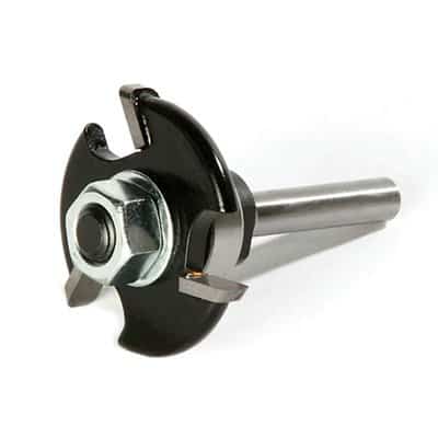 Metal router bit on a white background